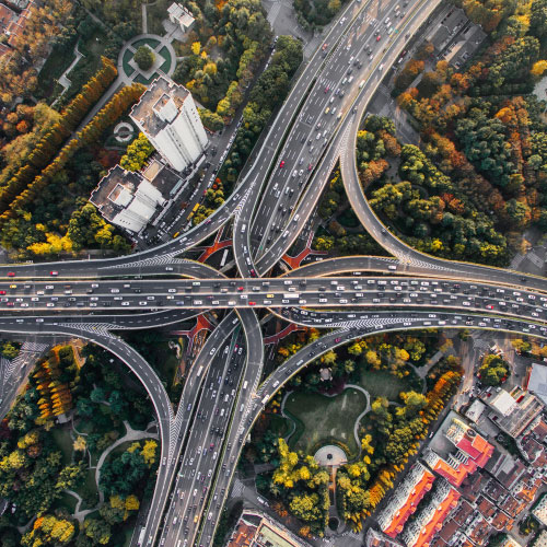 A overhead picture of a highway with on and off ramps