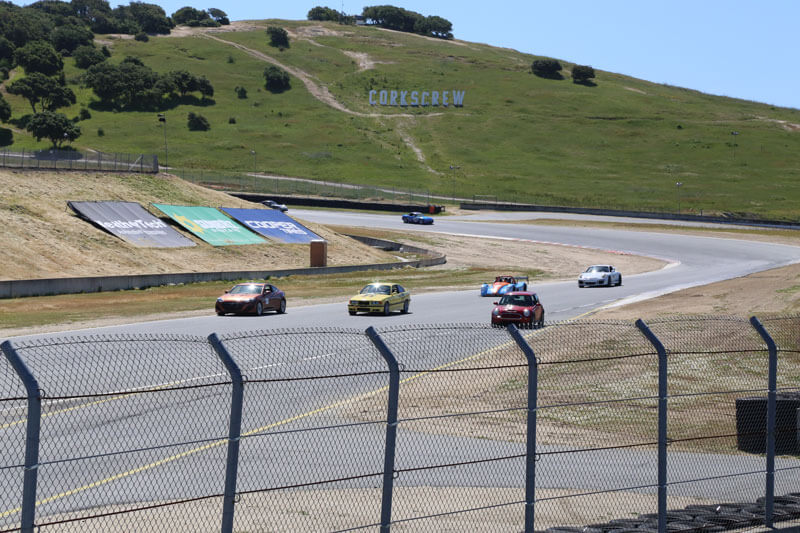 Jon Walton races past Corkscrew, a dramatic set of turns that drop the equivalent of a 10-story building in a short distance at WeatherTech Raceway Laguna Seca in Monterey, Calif.